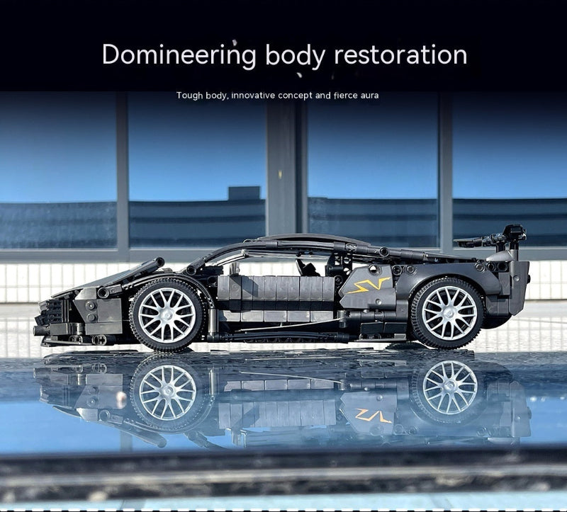 Toy car model on a reflective surface with a modern building background
