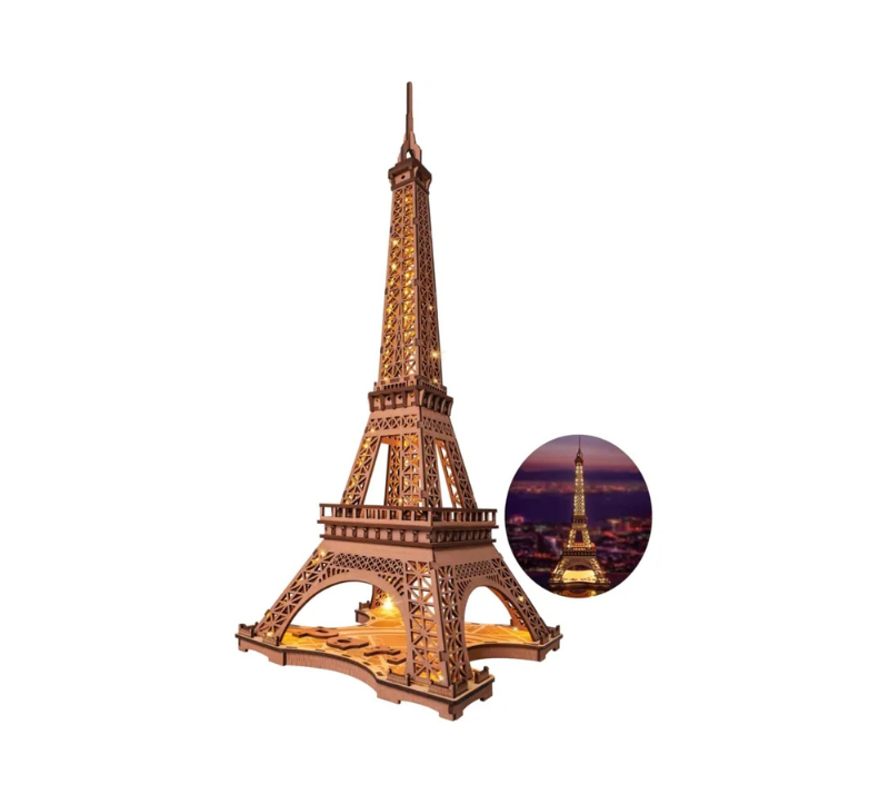 Model of the Eiffel Tower with a inset showing a night view.