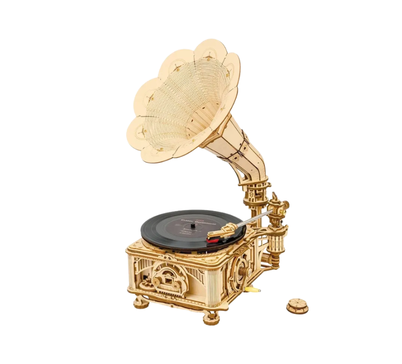 Gold gramophone model on a white background