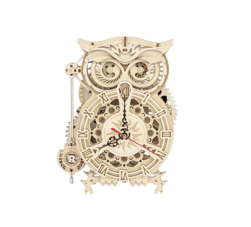 Wooden mechanical owl clock model on a white background
