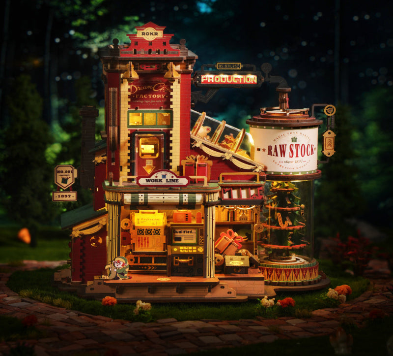 Detailed model of a factory with various signs and structures, set against a dark background.
