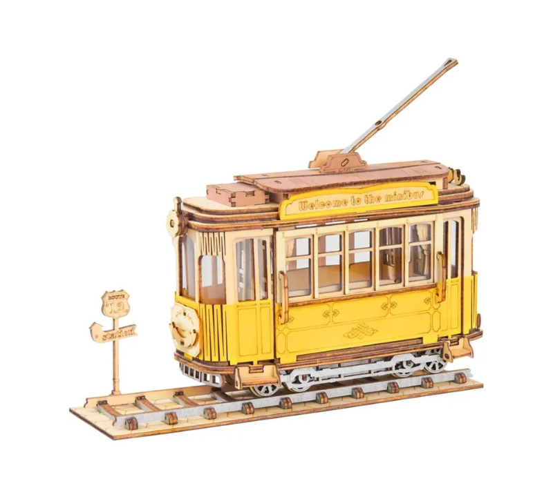 Yellow tram model on a white background