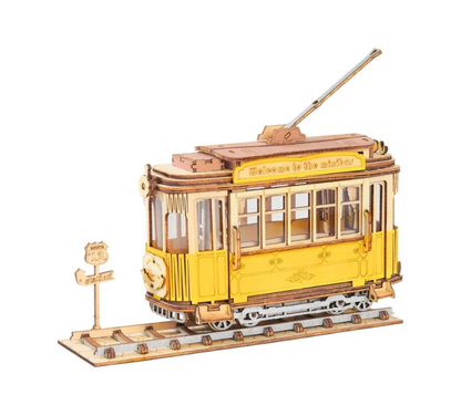 Yellow tram model on a white background