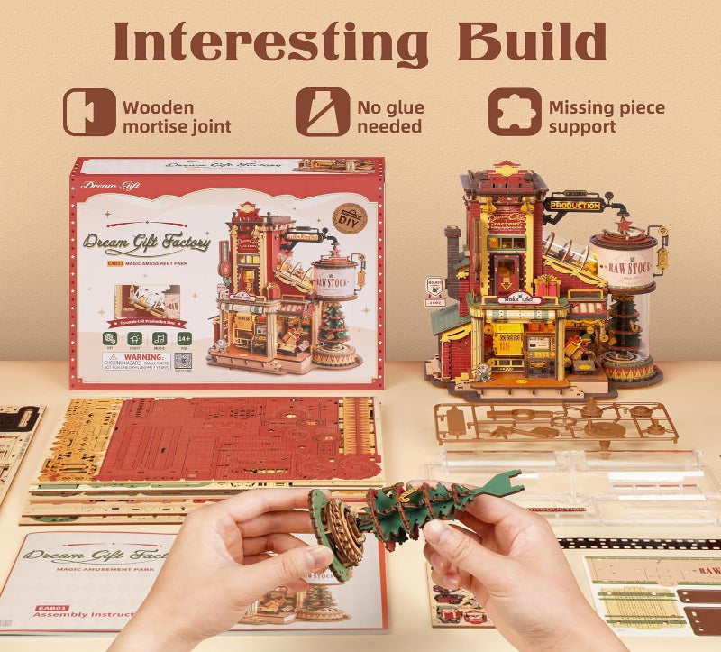 Wooden model building set with instructions and a completed model on a beige background